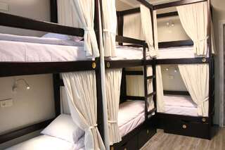 Хостелы Hostel Sputnik Харьков Спальное место на двухъярусной кровати в общем номере для мужчин и женщин-11